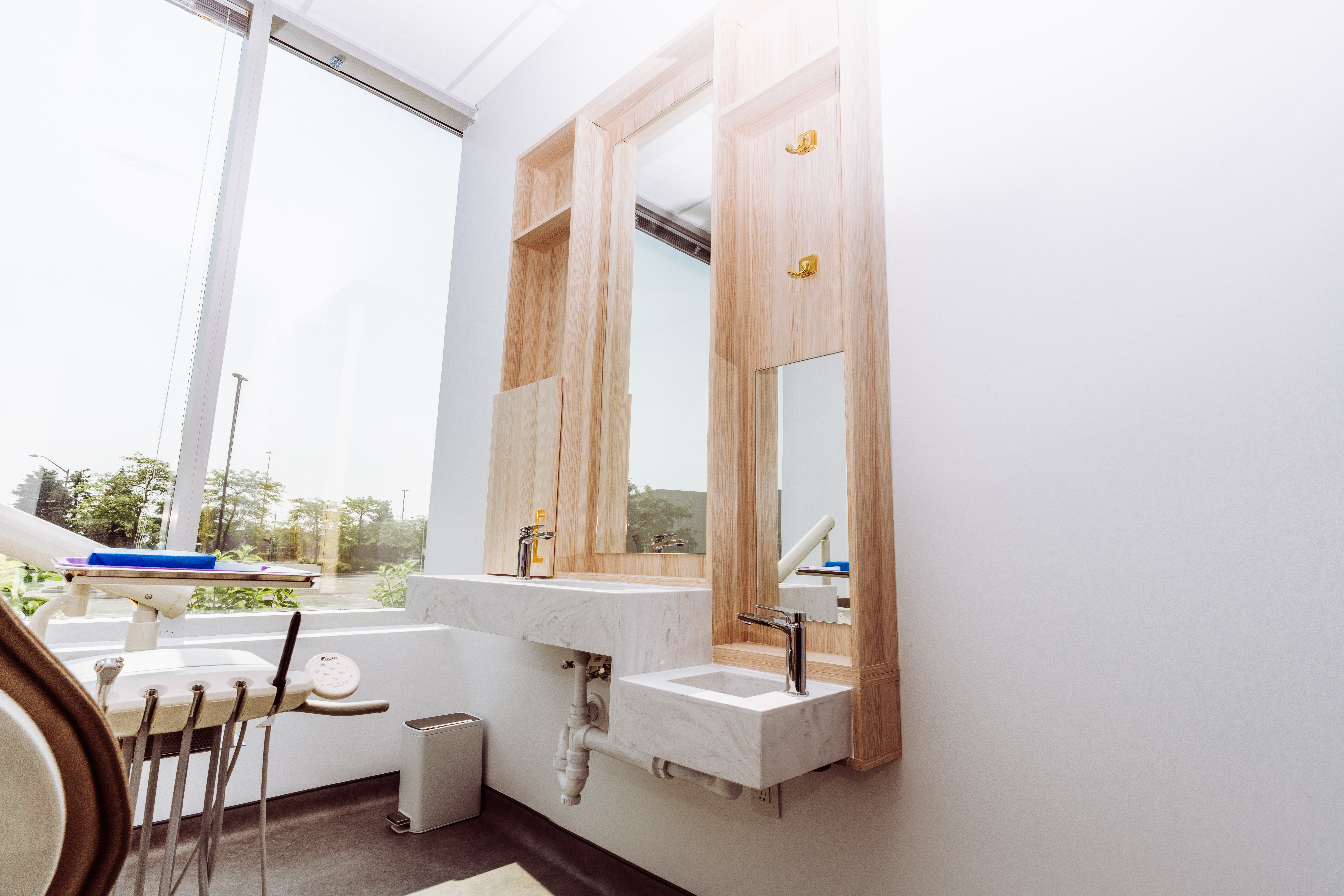 DS Dental exam room with wood vanity and marble countertop