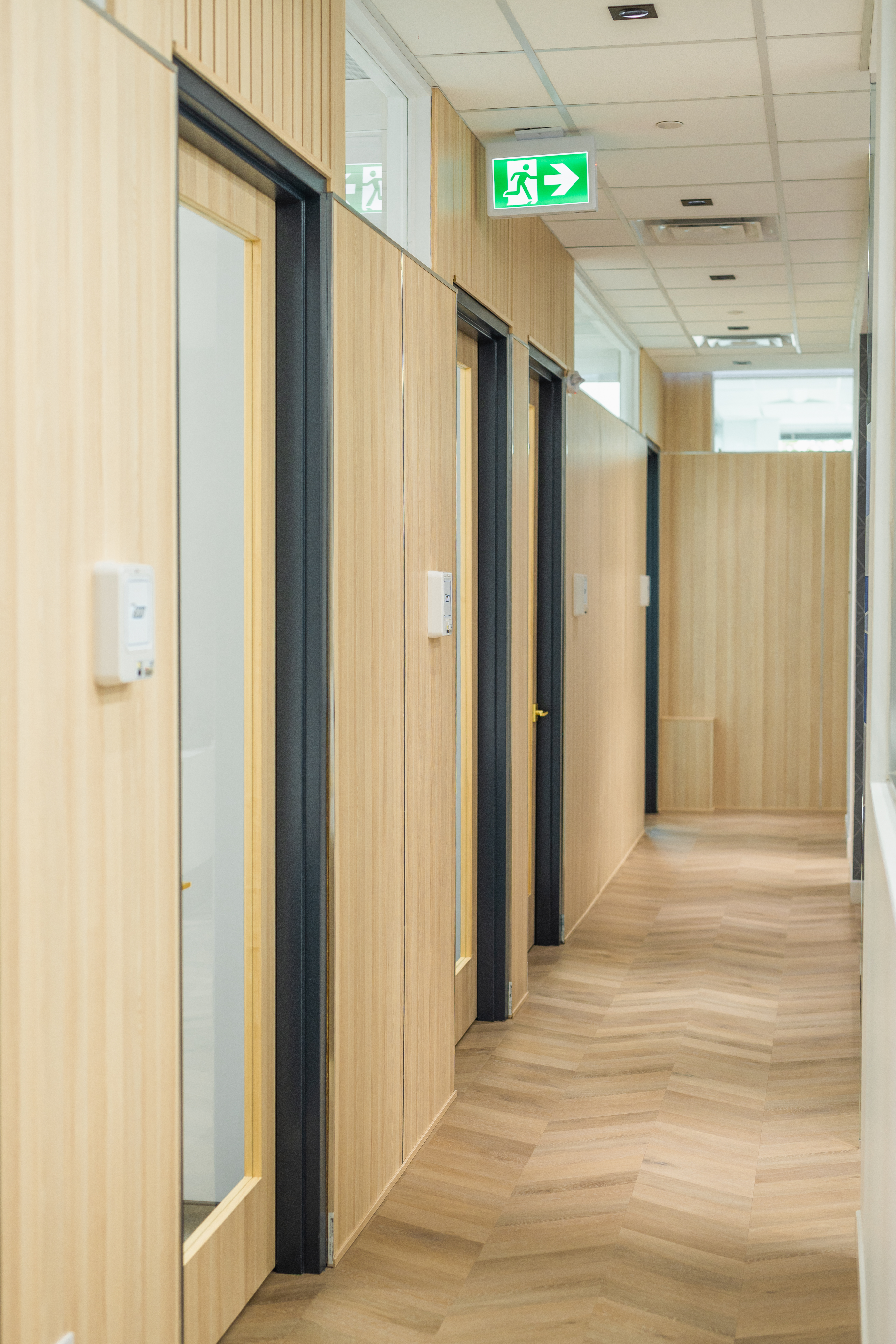 DS Dental clinical corridor with wood paneling