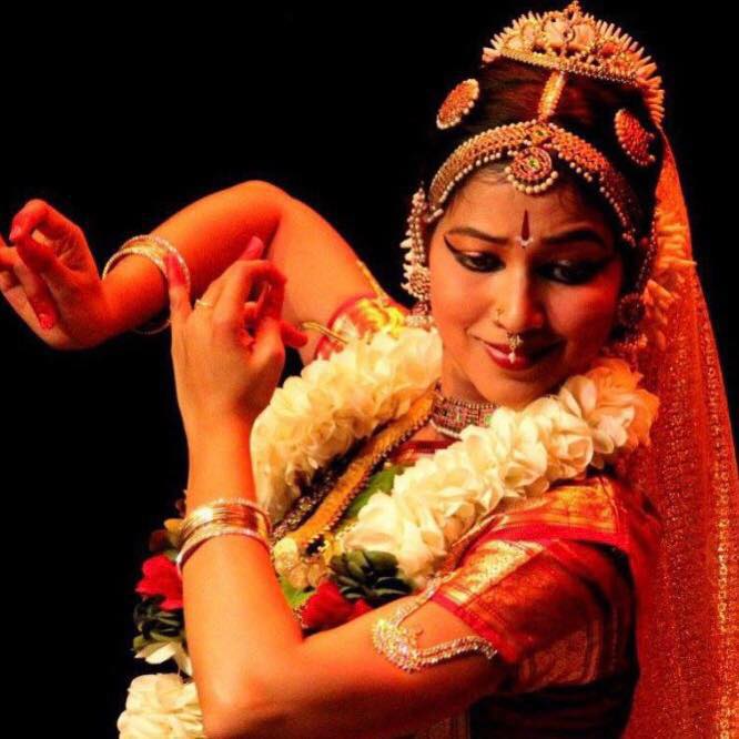 Bharathanatyam dancer performing traditional mudra hand gesture