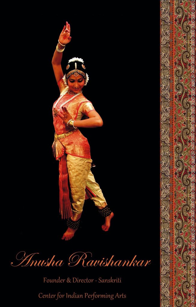Bharathanatyam dancer in full traditional costume performing on stage