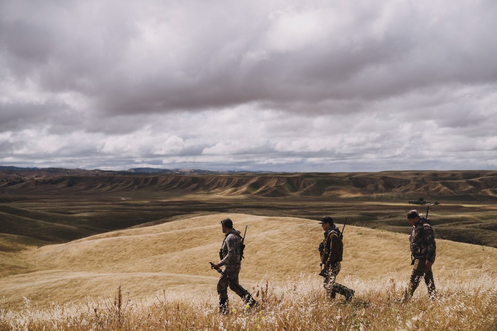 Guided hunters in the field on Camatta Ranch terrain