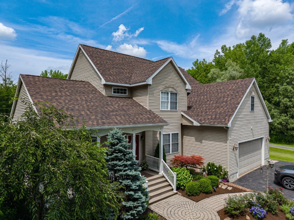 Home exterior showing roof and siding