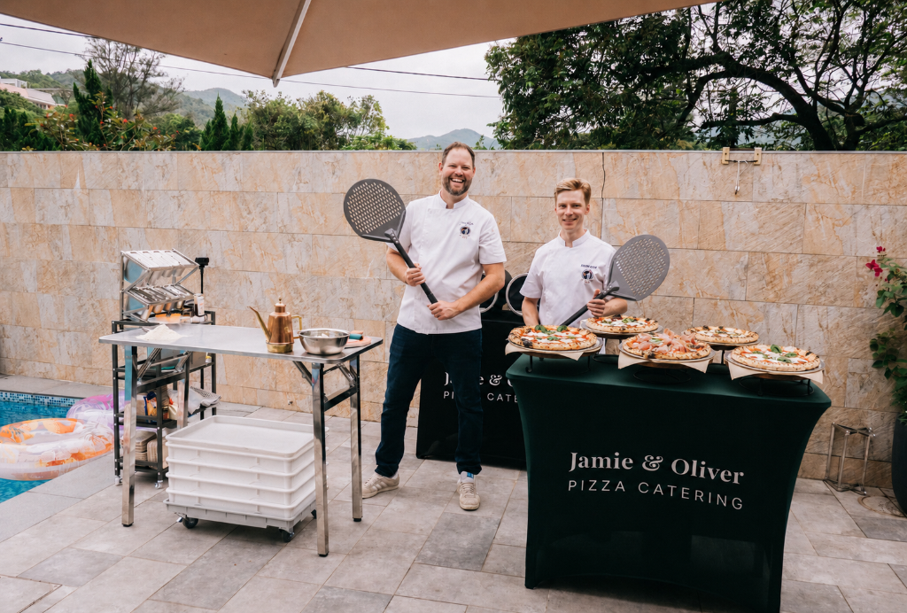 Jamie and Oliver at a pizza catering event