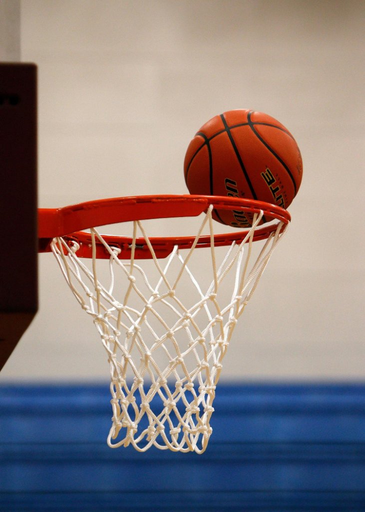 Students playing basketball