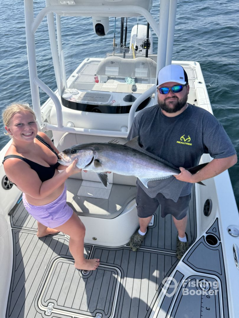 Couple with Big Amberjack
