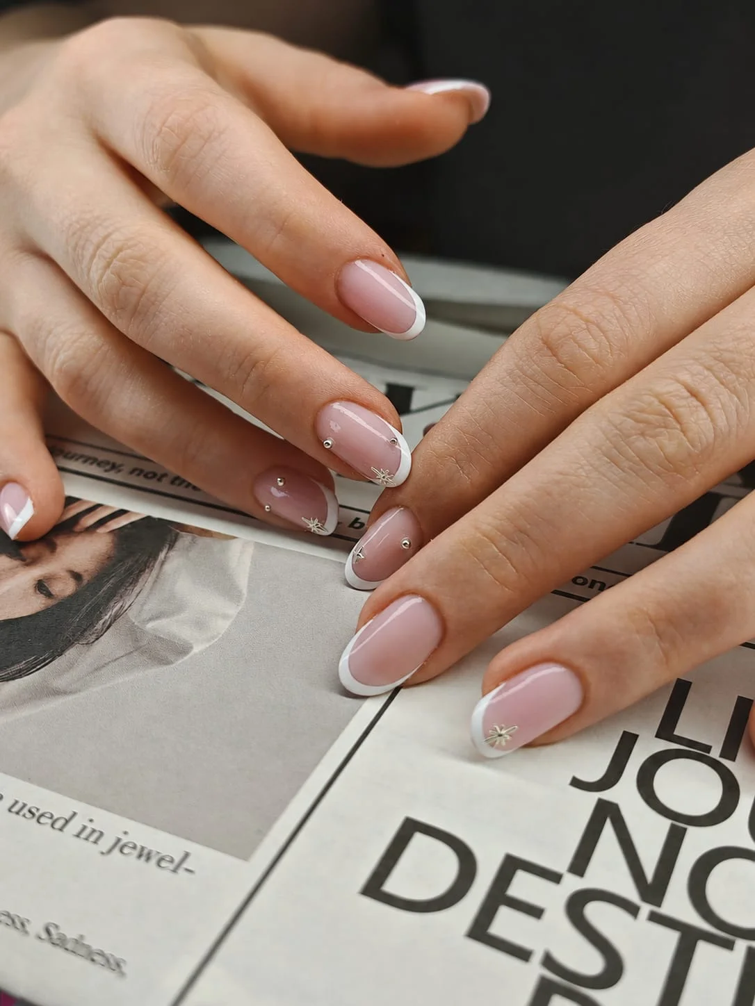 White French tips with tiny stars