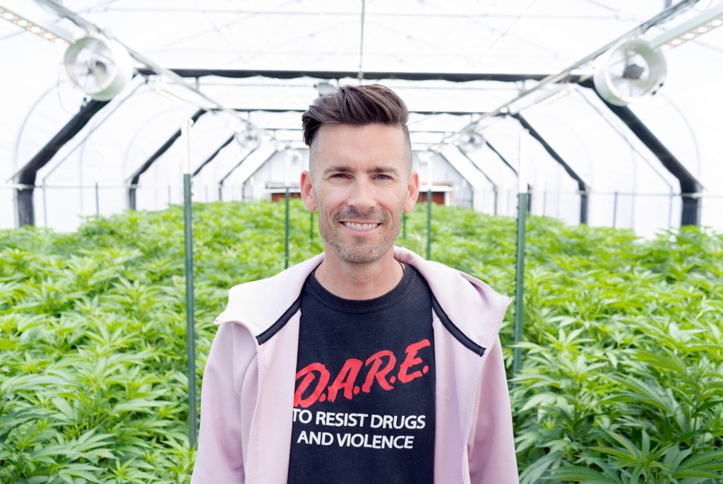 Craig Gross — DARE shirt in the cannabis greenhouse