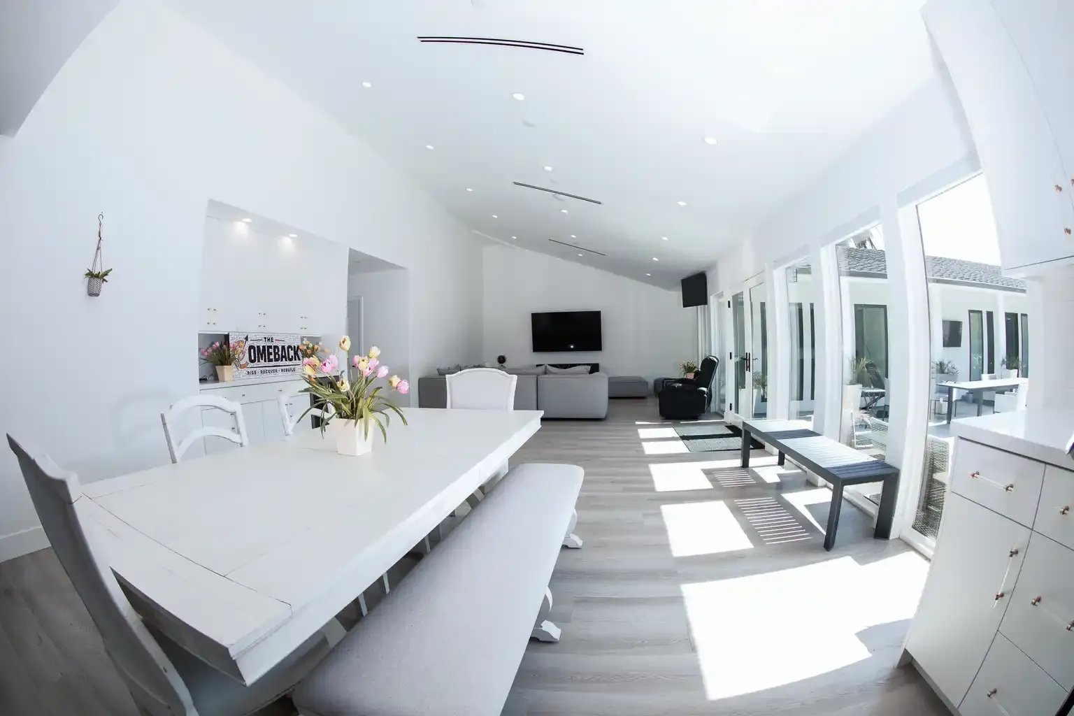 Bright open entryway with French doors leading to backyard at men's sober living home Van Nuys CA — The Comeback SL
