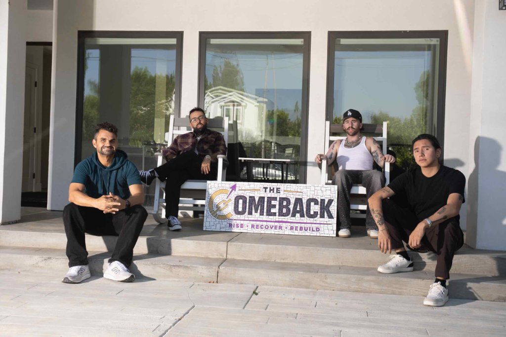 Founder and residents of The Comeback Sober Living seated on the front steps with The Comeback mosaic sign — men's sober living home Van Nuys CA
