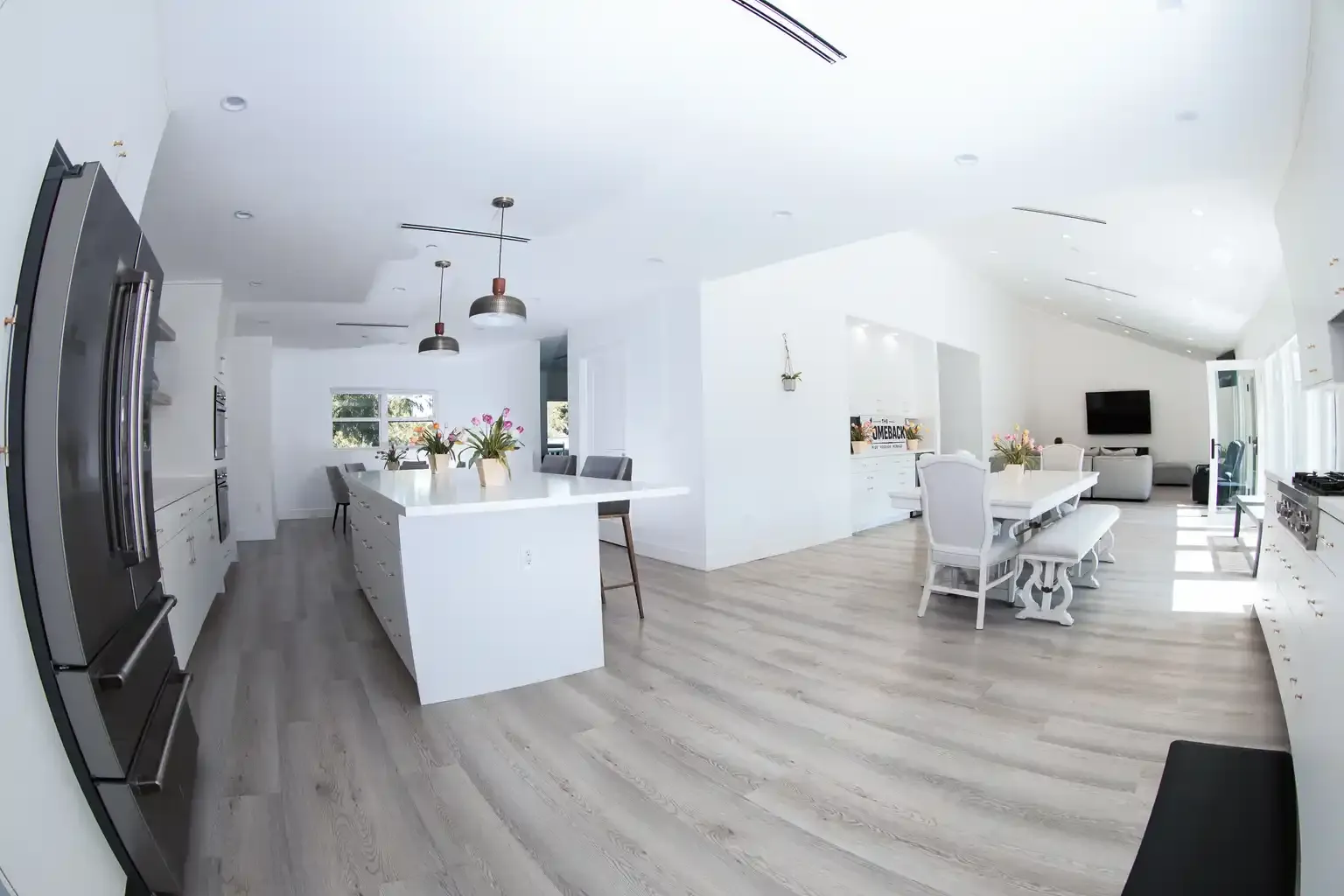 Chef's kitchen with large island and stainless steel appliances at men's sober living home Van Nuys CA — The Comeback SL