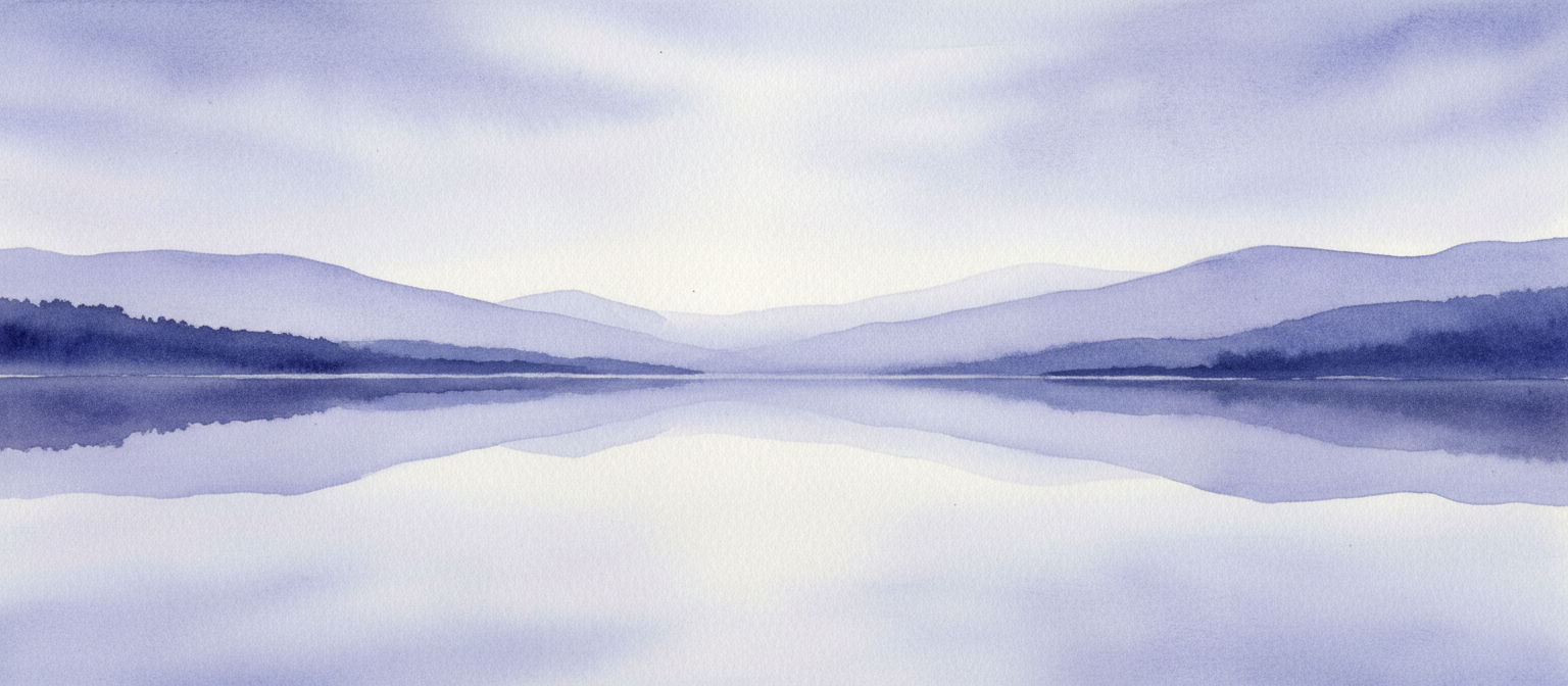 Soft indigo dusk sky over calm water