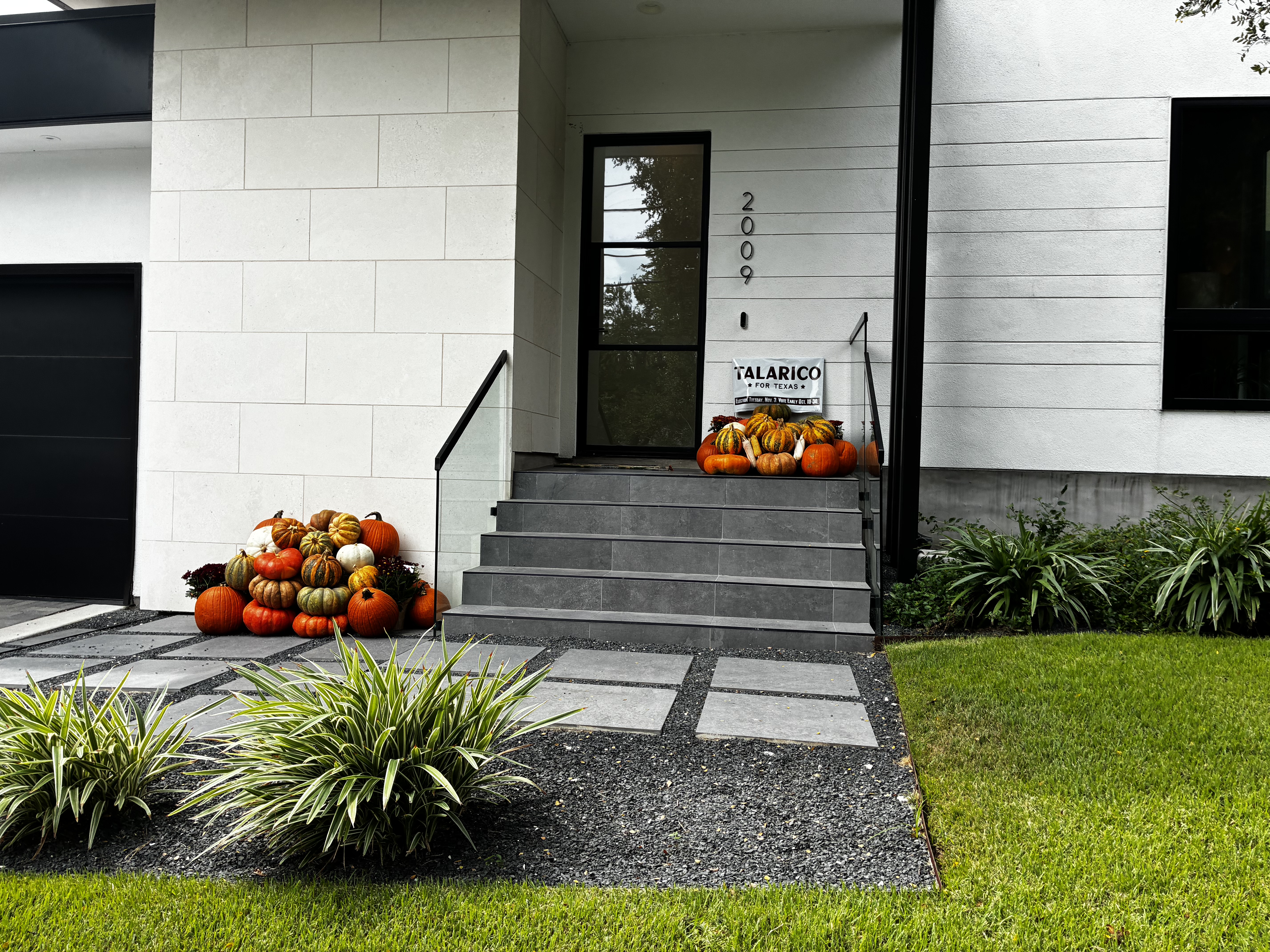 Modern two-story Austin home with Luxury pumpkin display — real installation