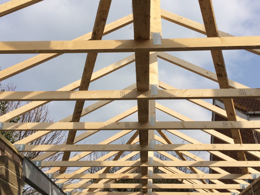 Roof rafters looking up during construction at Battledown