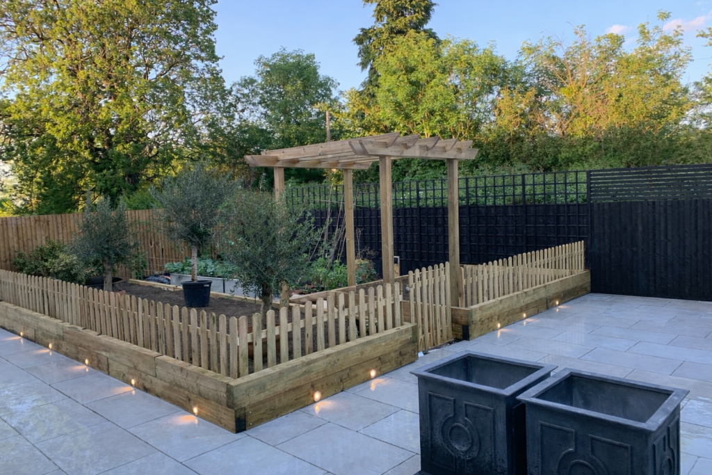 Leckhampton Gardens paving with raised beds and pergola