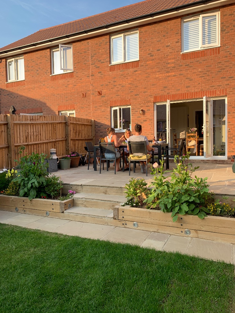 Cheltenham new build garden at sunset
