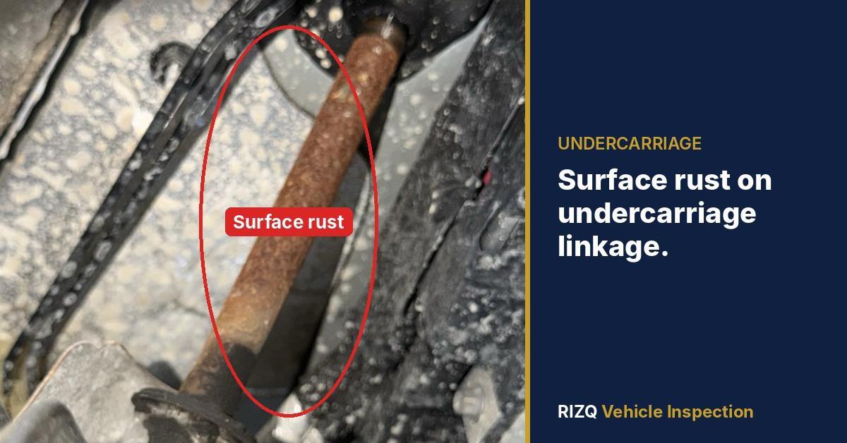 Surface rust across the undercarriage linkage