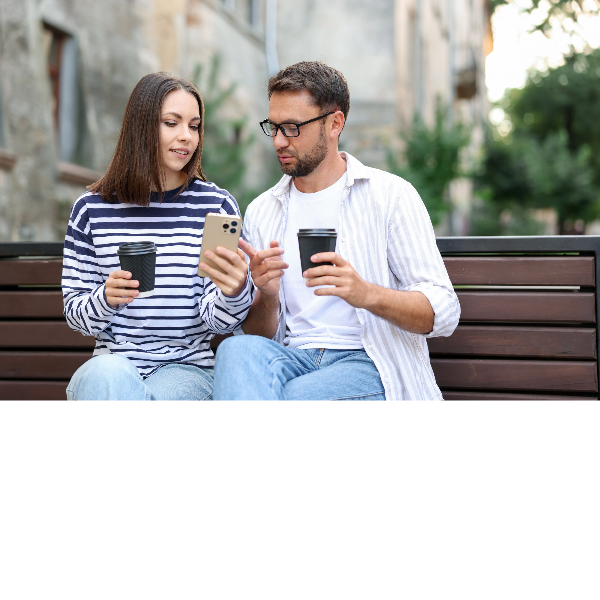 Co-parents happily viewing expense app