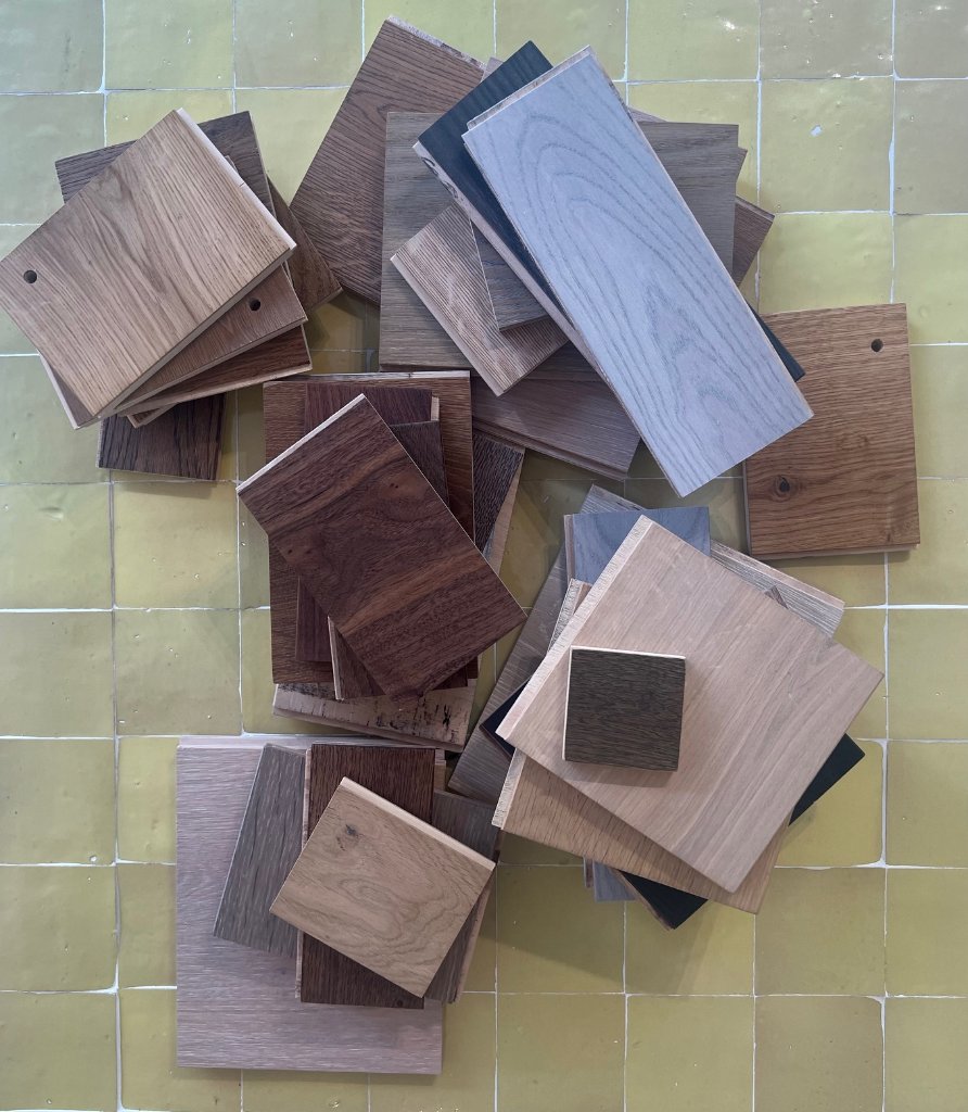 A pile of small wood floor samples