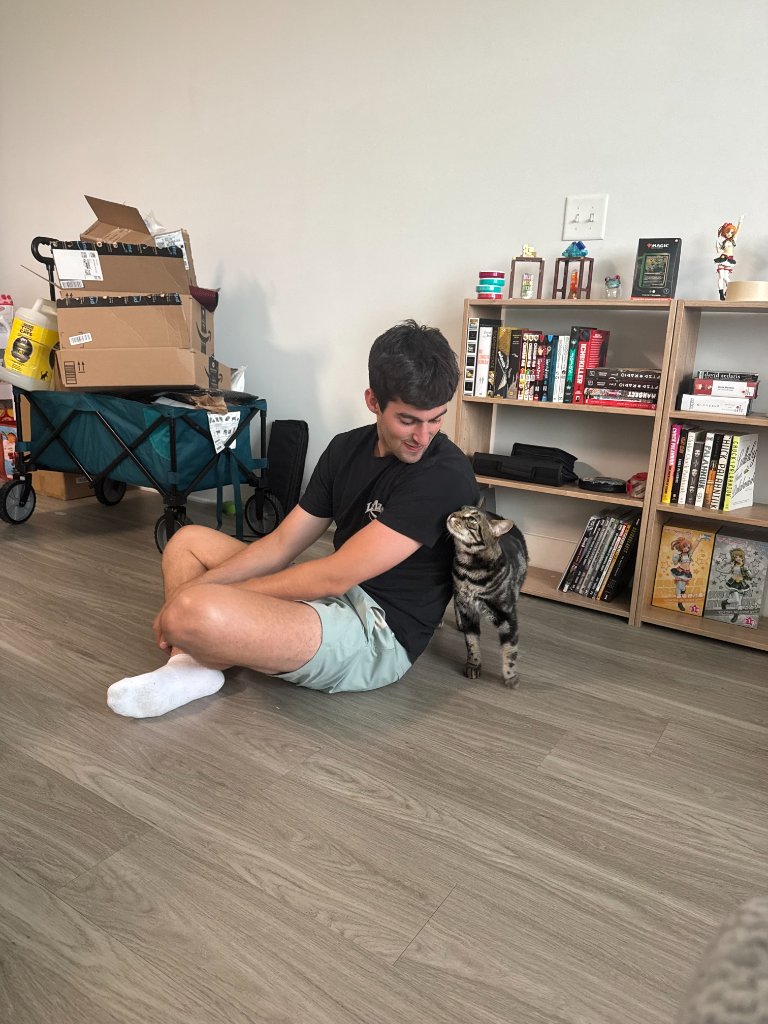 Andy with a tabby cat
