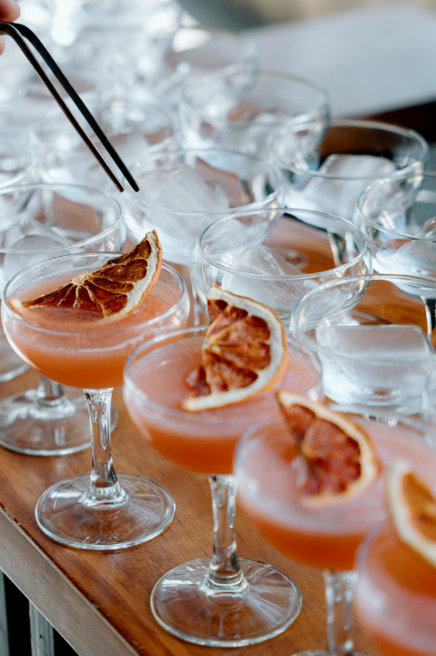 Craft cocktails with citrus garnishes — real photograph by Bruno Cervera