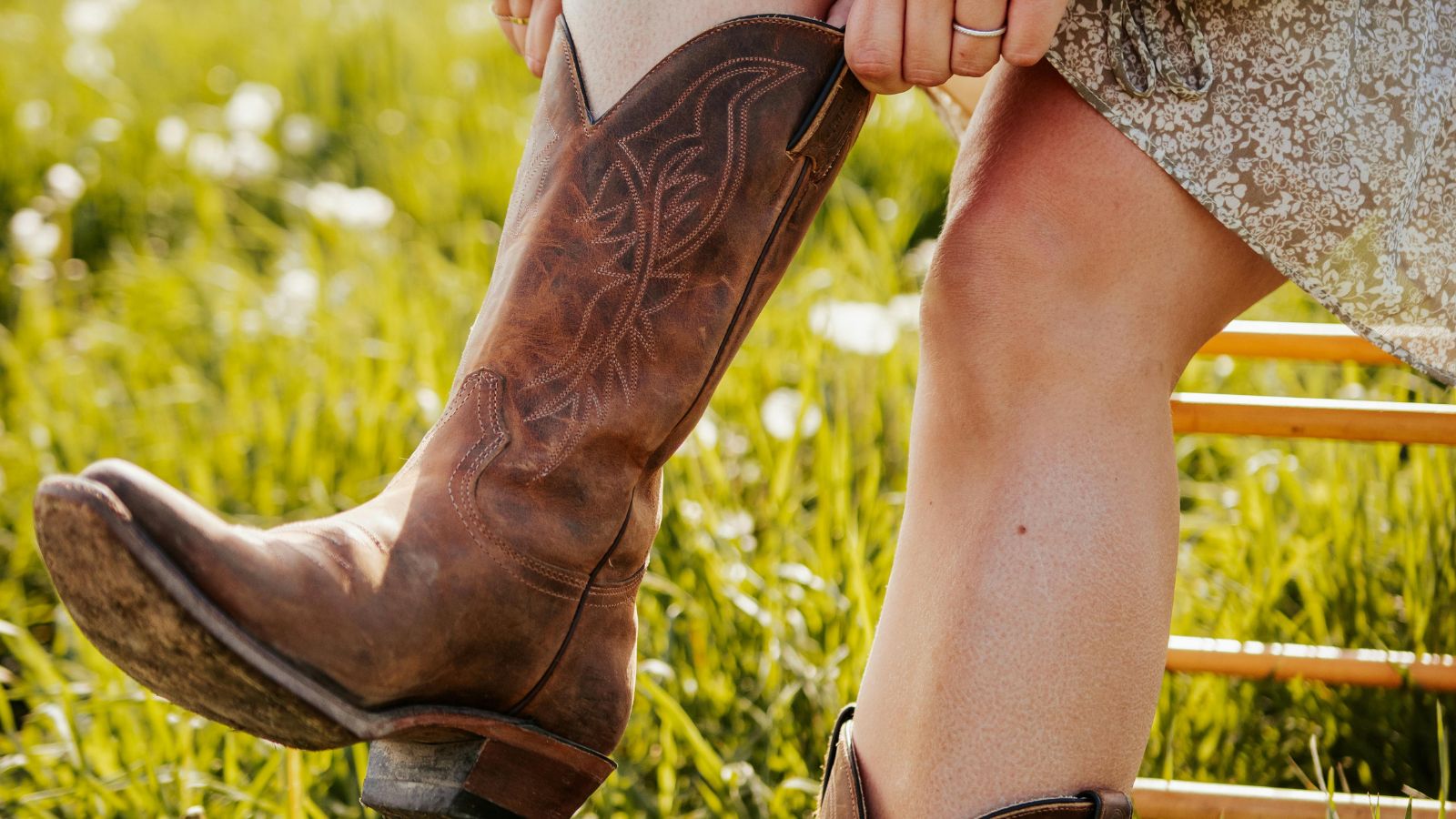 Close-up of brown embroidered cowboy boots. Real photograph by Kelly Carson.