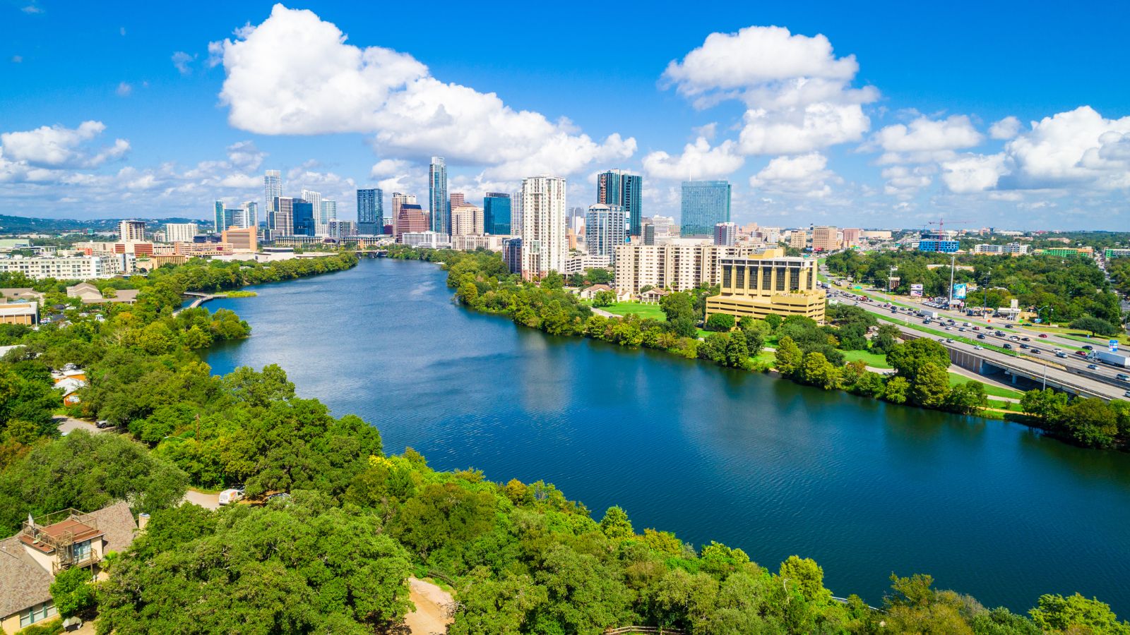 Austin Texas summer landscape. Real photograph by RoschetzkyIstockPhoto / Getty Images, sourced through Canva.