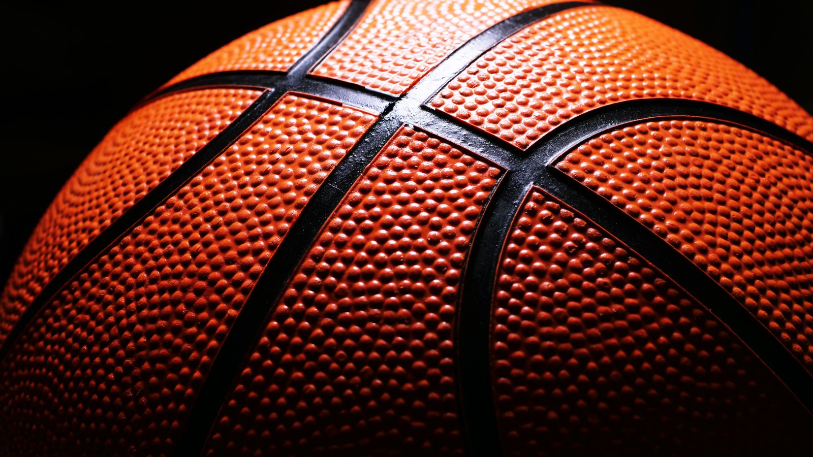 Basketball close up. Real photograph by Janka Dharmasena / Getty Images, sourced through Canva. Illustrative stock photo; not a photograph of the venues or services reviewed.