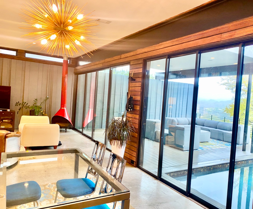 Dining area that extends to living and pool areas