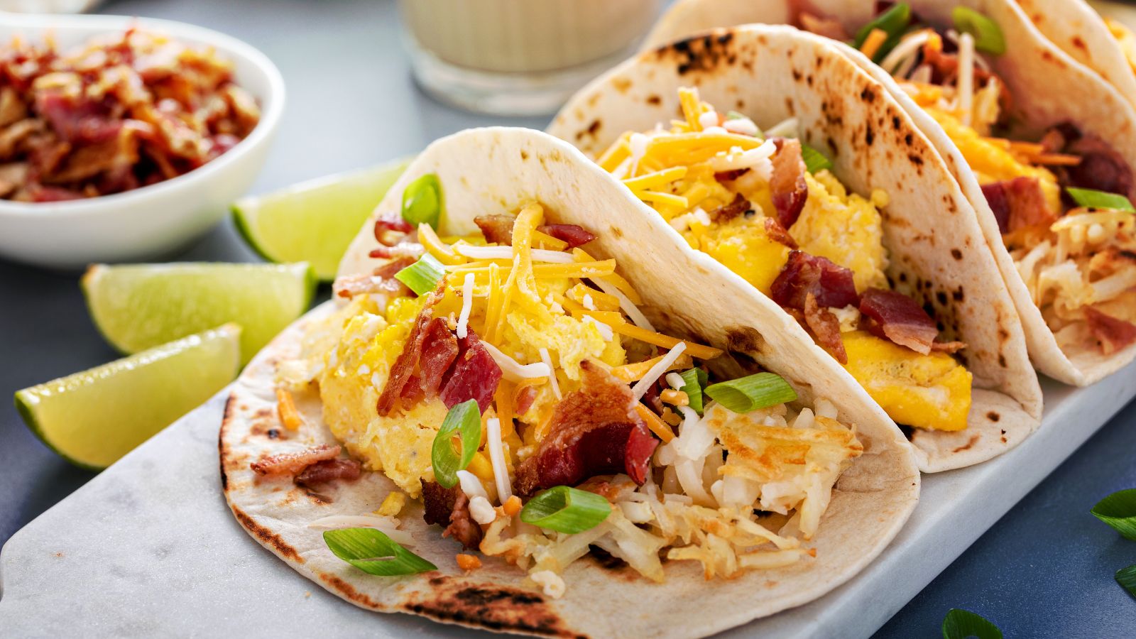Breakfast Tacos with Hashbrowns, Eggs and Bacon. Real photograph by Sonda Stefan's Images, sourced through Canva. Illustrative stock photo; not a photograph of the venues or services reviewed.