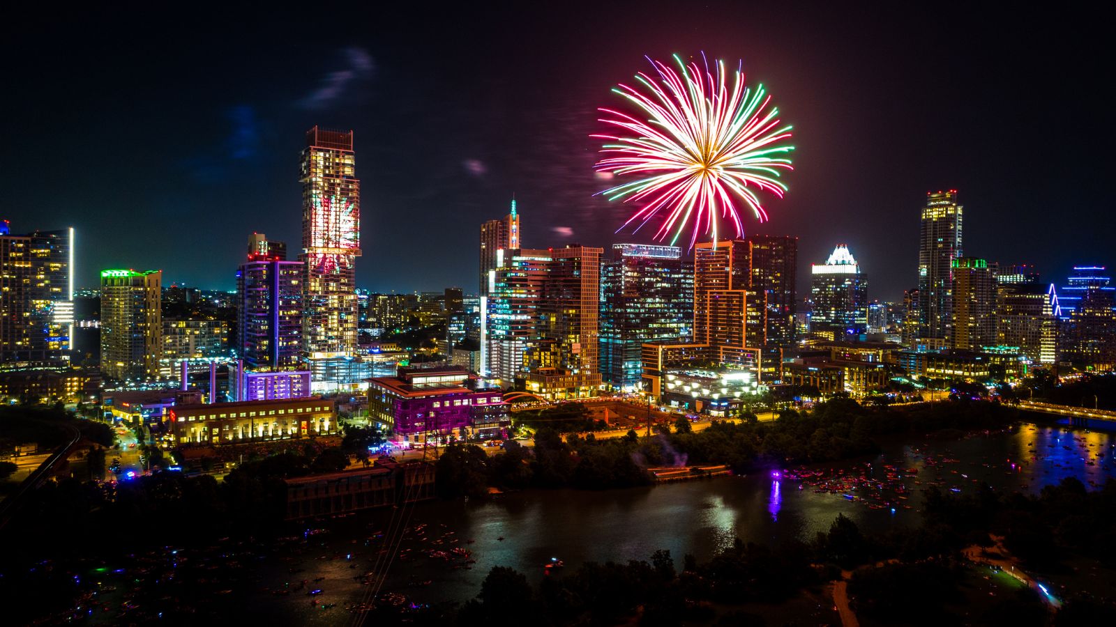 Fireworks over Austin Texas. Real photograph by RoschetzkyIstockPhoto / Getty Images, sourced through Canva.