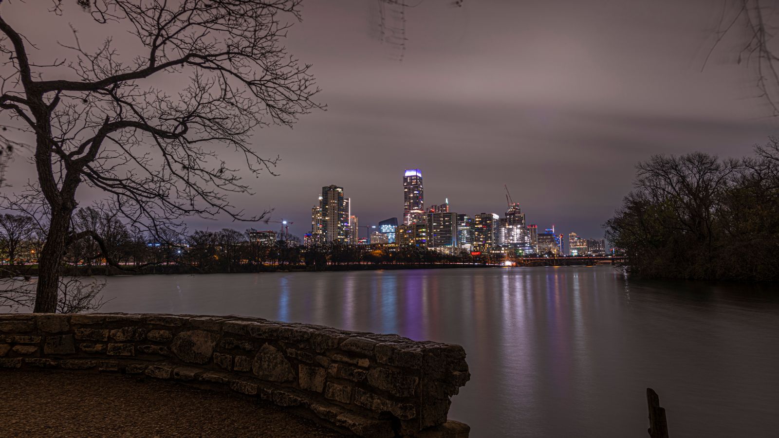 Austin Skyline from Lady Bird Lake (Town Lake). Real photograph by TheNewGuy03 / Getty Images, sourced through Canva.