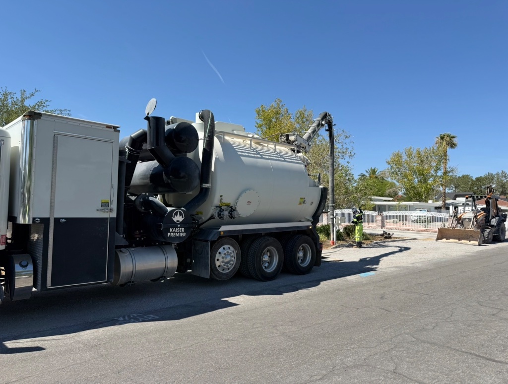 Hydro-excavation in progress on residential site