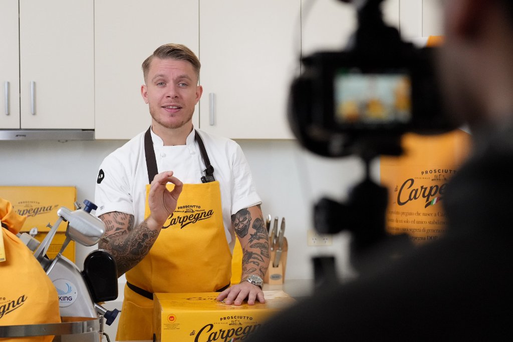 Chef Andrea Vignali cooking in professional kitchen