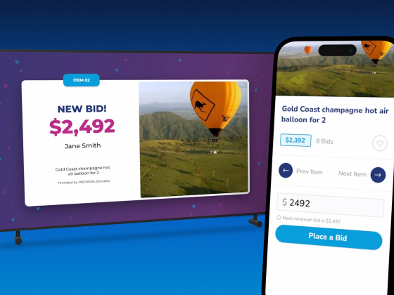 Fundraising platform showing live bidding on screen and mobile