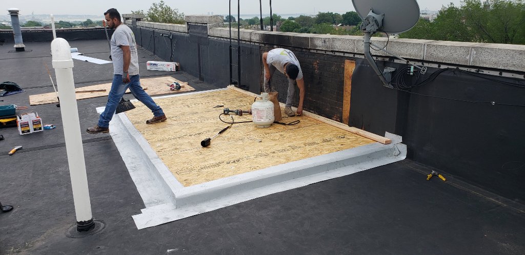 Green Tarp Flat Roof