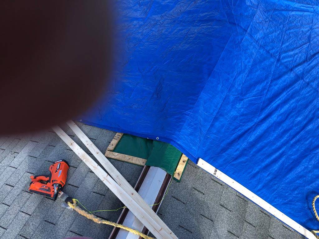 Blue Tarp Nail Gun NJ B