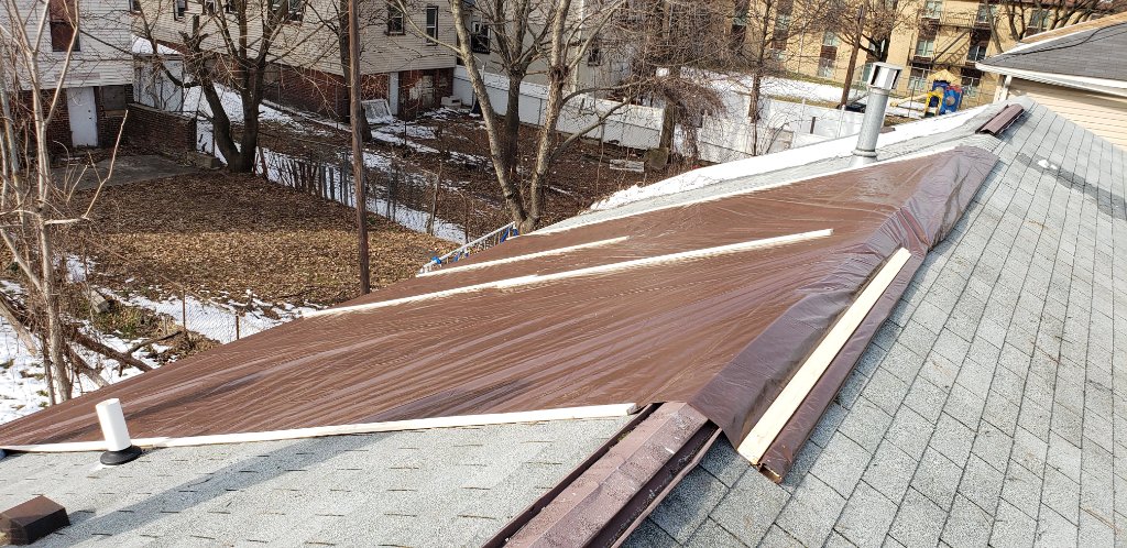 Brown Tarp Roof Protection