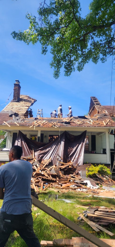 Crew Nailing Shingles 2023