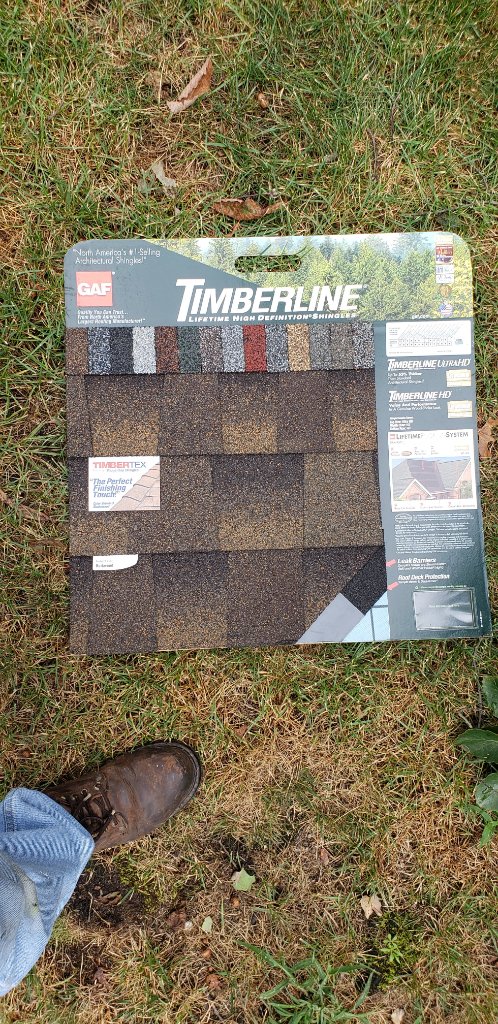 Brown Tarp Over Roof