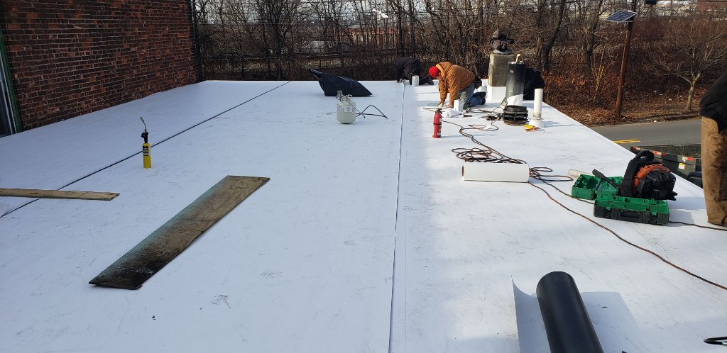 White Membrane Install Crew