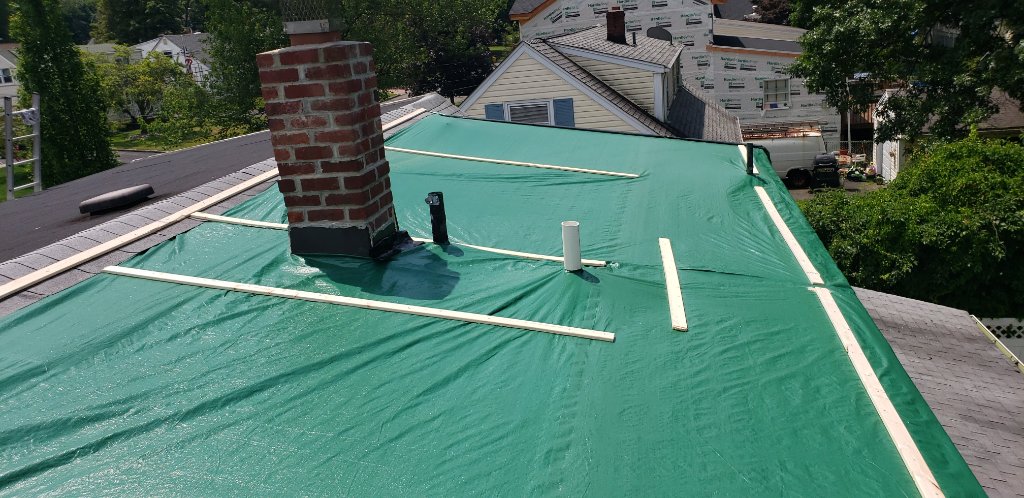 Tarp Secured on Roof