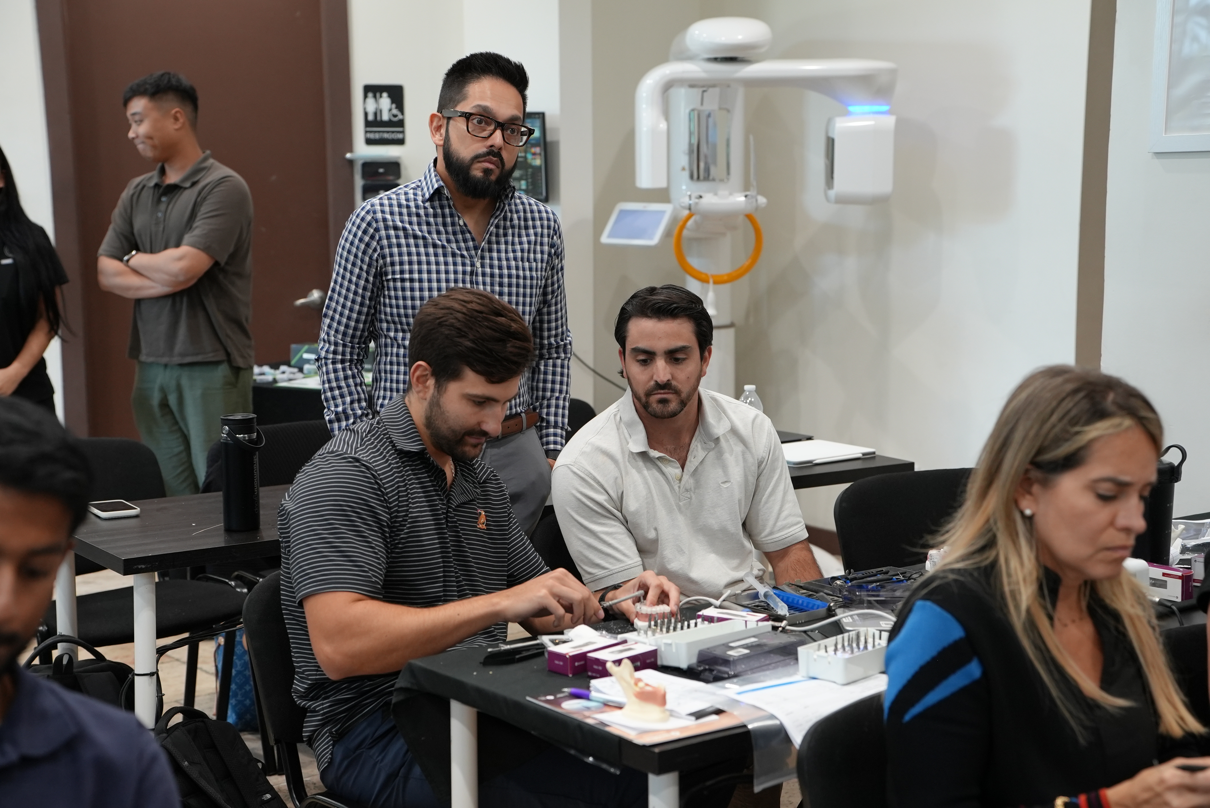Doctors collaborating on guided surgery workflows