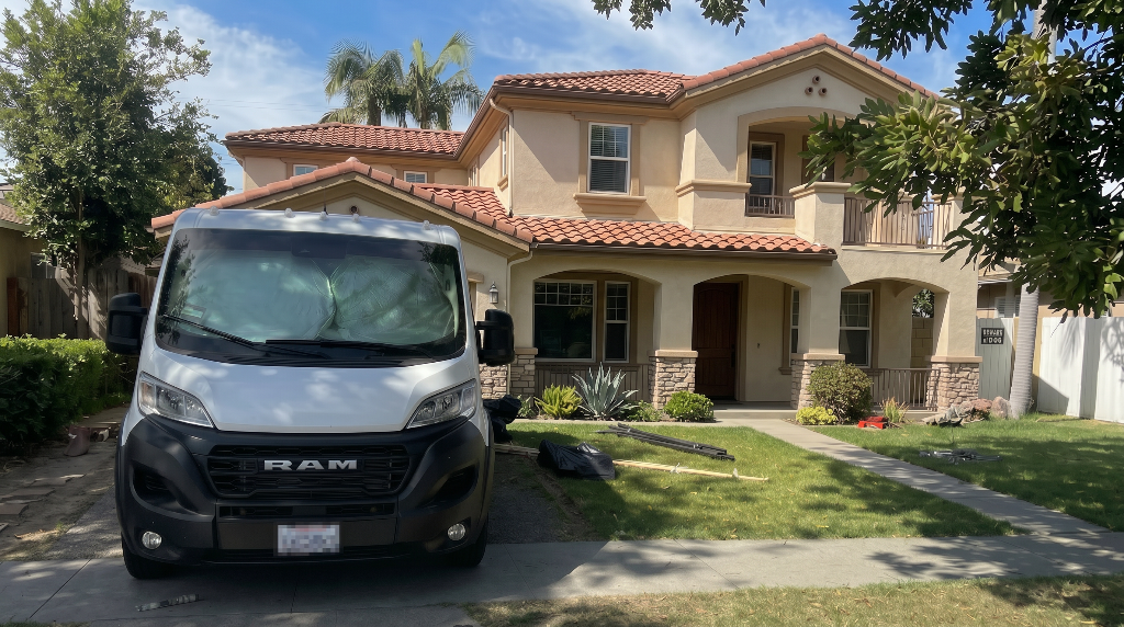 Project site with NextLevel Repipe service van and home exterior