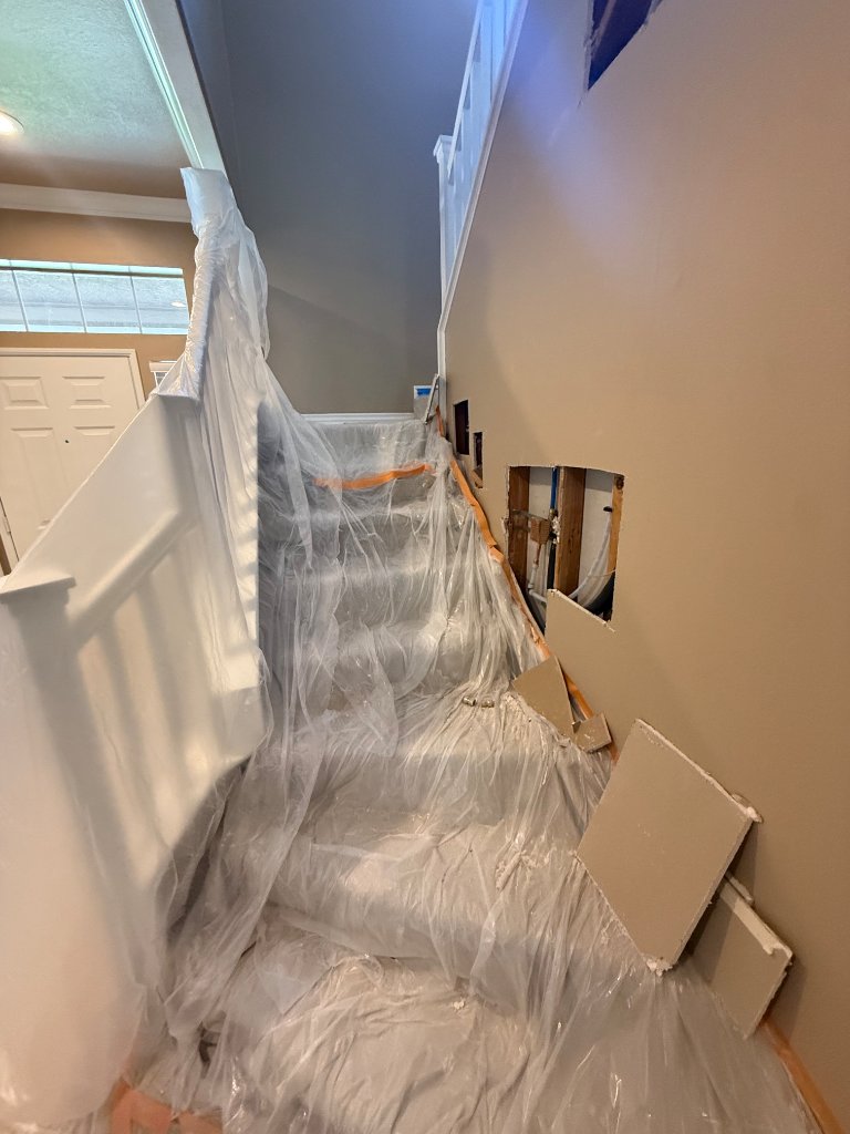 Clean pipe routing through wall cavity