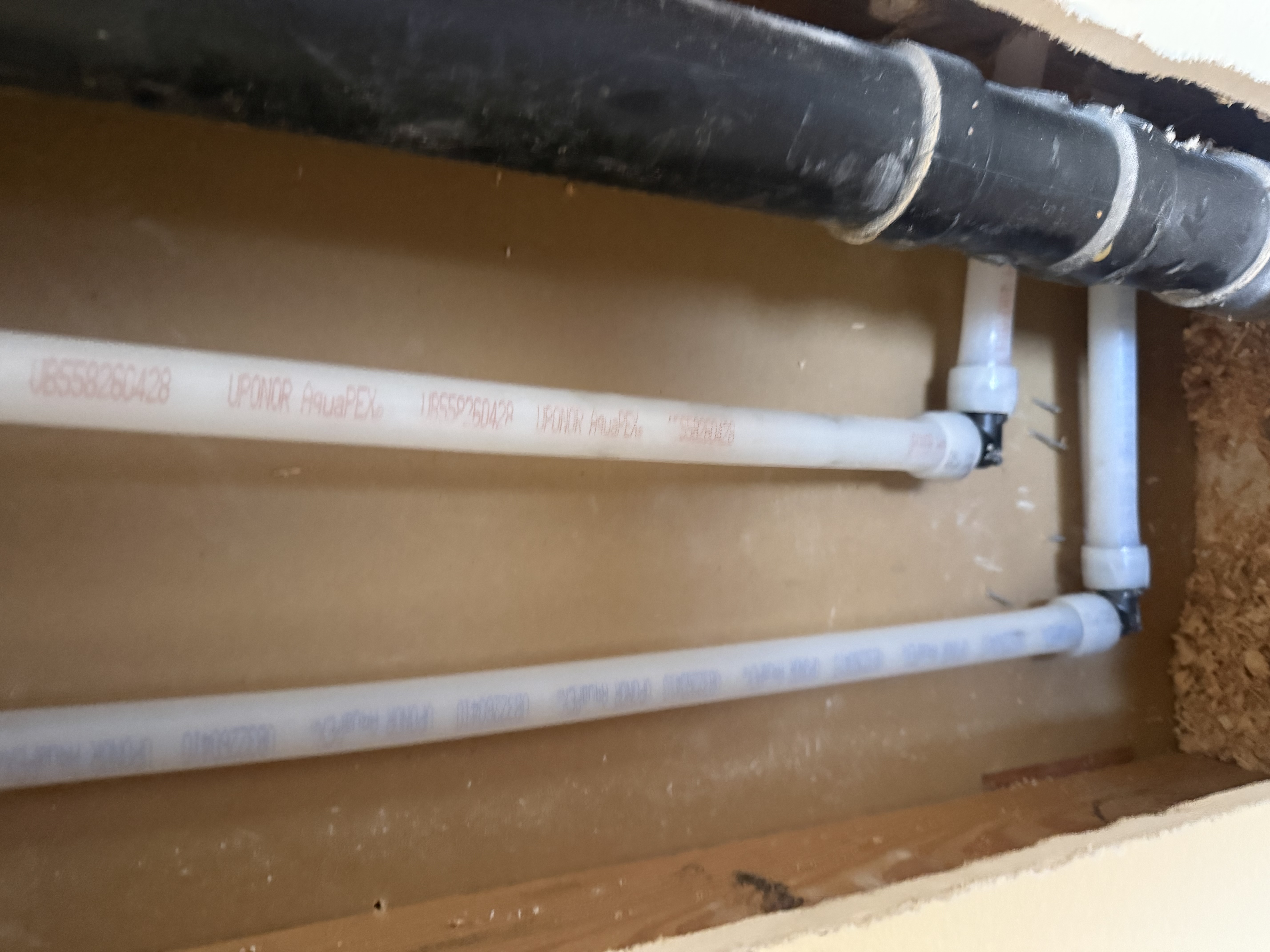 Interior walls opened and protected during a PEX-A repipe installation