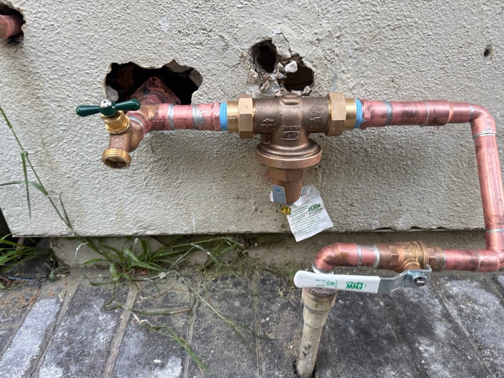 Exterior stucco openings for outside pipe replacement