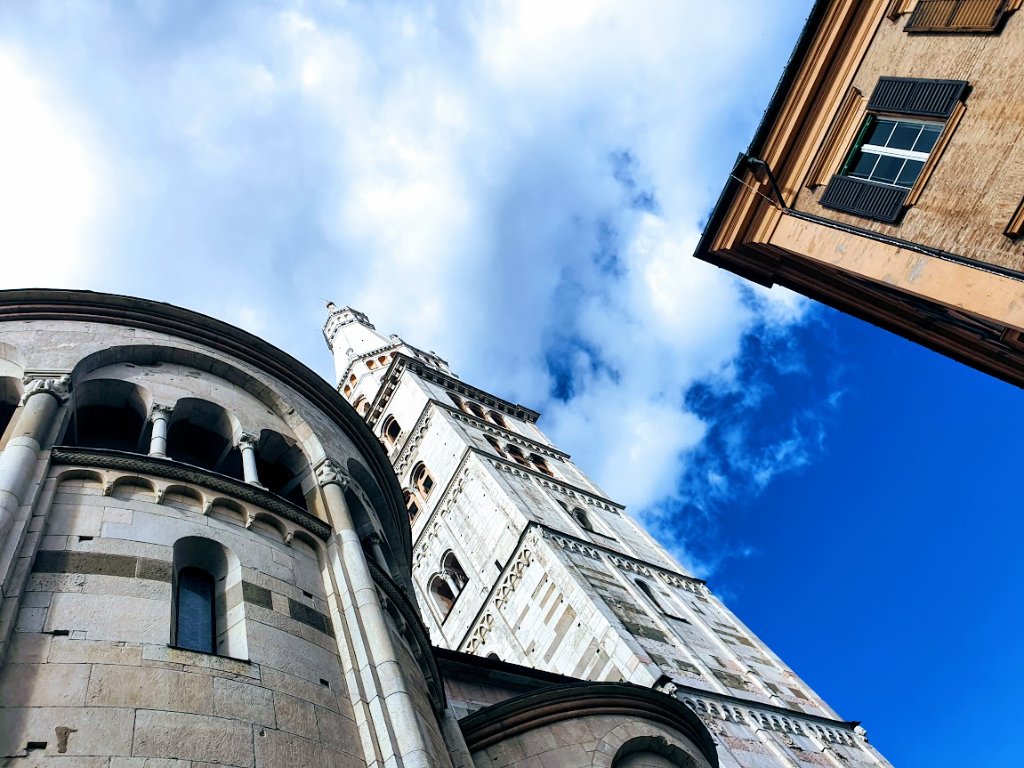 Ghirlandina tower and Modena Cathedral seen from below, UNESCO heritage