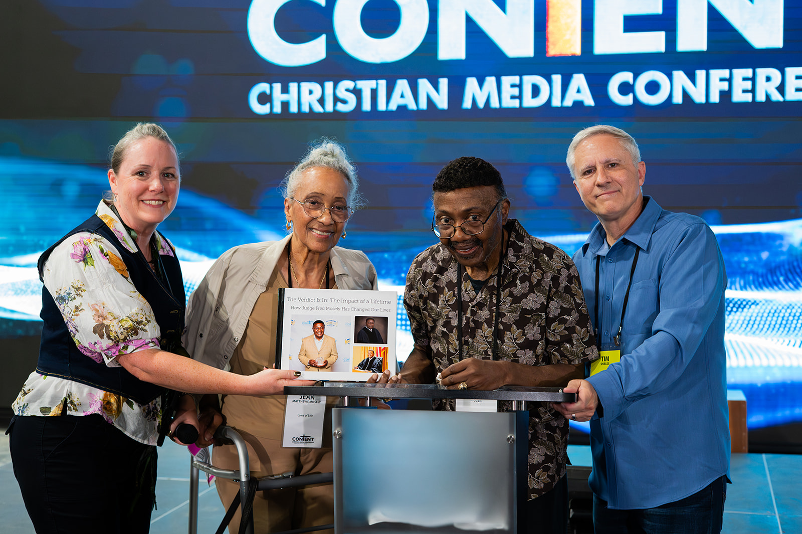 Tim and Michelle serving together on the CONTENT stage