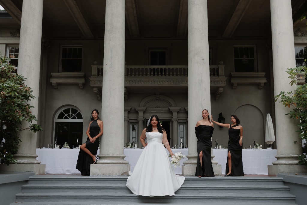Bride and bridesmaids on the steps