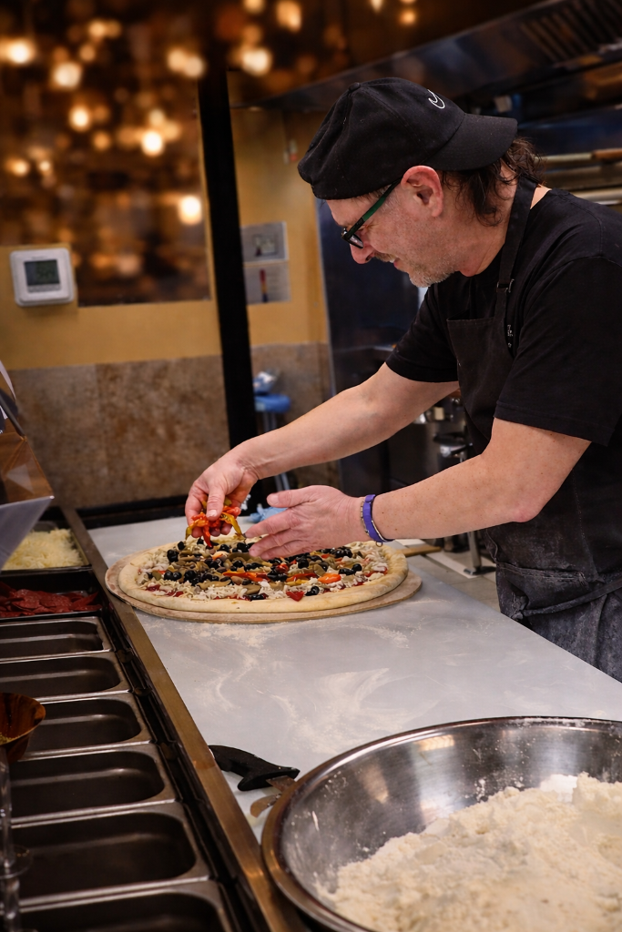 Chef making pizza